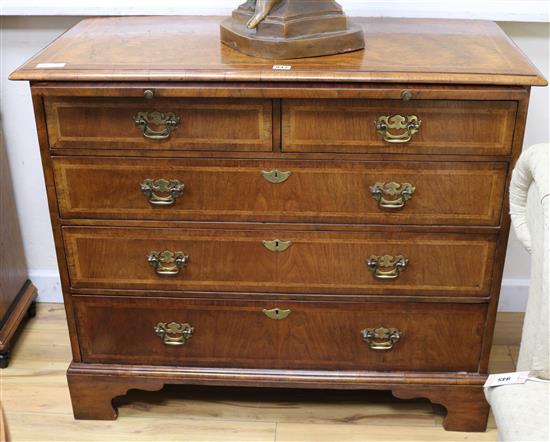 A walnut chest with slide W.97cm